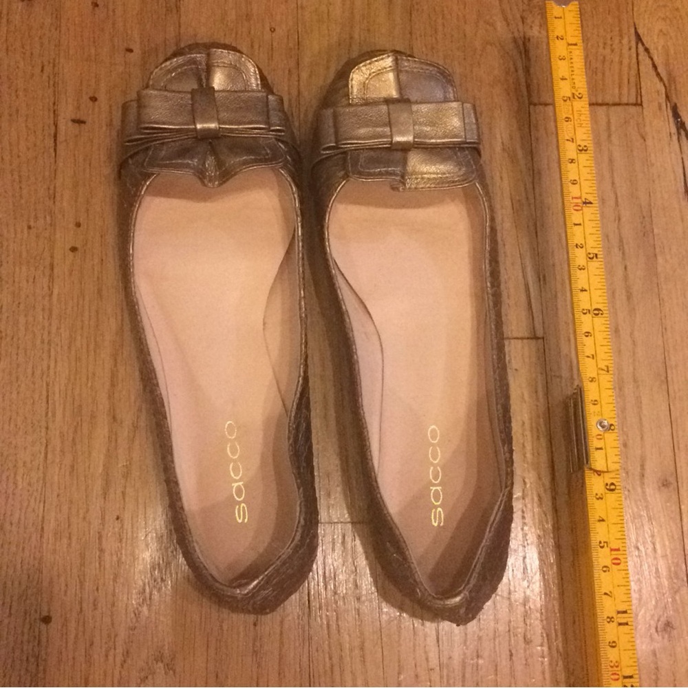 Metallic gold Sacco ballet flats with bow detail snakeskin texture